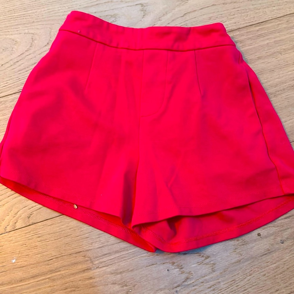 A bright pink size 10 girls shorts